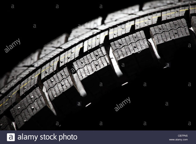 part-of-brand-new-car-tyre-close-up-horizontal-composition-CB7PN5.jpg